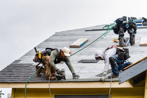 Professional Gutter Installation technician working in Washburn, ND